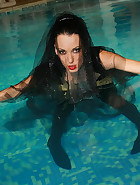 Gothic Mistress gets wet in PVC, pic #9