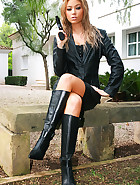 Killer asian babe wanks in leather, pic #1